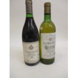 A bottle of Costino, Rioja Gran Riserva 1980 and a bottle of Les Douches, Bordeau blanc de blanc