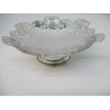 An early 20th century silver fruit bowl by S J Levi & Co, Birmingham 1935 with a scroll, pierced