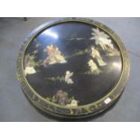 A vintage black painted Chinese carved soapstone and gilt coffee table on cabriole legs