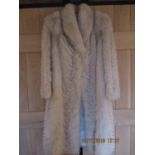 A Saga fox silver fox fur coat, 45" long x 40" chest