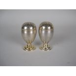 A pair of George IV silver-gilt small Casters of egg shape with engine turned design, London 1822,