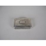 A George IV silver Snuff Box of oblong form with ribbed and zig zag design, vacant cartouche,