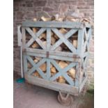 A blue painted Severn Valley Railway Log Trolley with folding sides on three wheels, stamped S.R