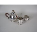 A George V silver three piece Tea Service of circular form, Birmingham 1925