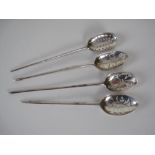 Four Georgian Mote Spoons, one with dot pierced bowl