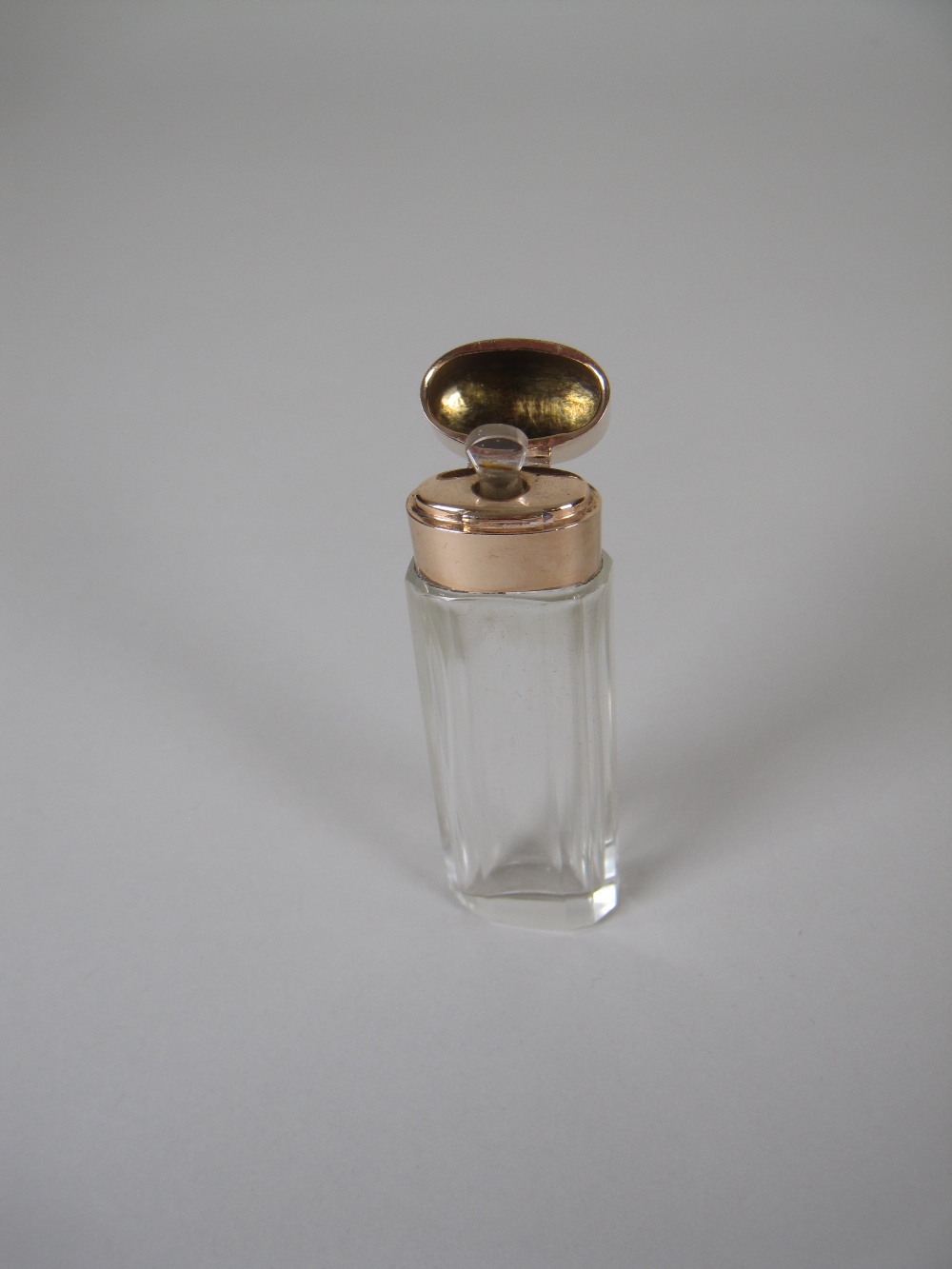 A gold mounted cut glass Scent Bottle and Stopper