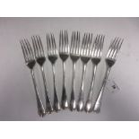 Eight George IV silver Dinner Forks, old english pattern with feather edges and engraved initials,