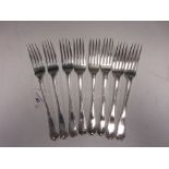 Eight Georgian silver Dinner Forks with feather edges, various dates and makers including Chawner