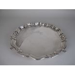 A George V silver shaped circular Salver on three scroll feet, Sheffield 1925, 13 1/2in D