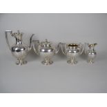 A Victorian silver four piece Tea and Coffee Service with floral and leafage engraving, vacant