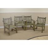 A set of four teak Garden Armchairs with slatted back and seats