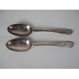 A pair of George II Scottish silver Table Spoons, hanoverian pattern with leafage engraving and