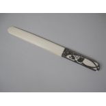 An Art Nouveau silver handled ivory Paperknife with finely detailed berry and leaf design, 12in