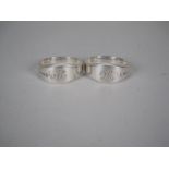 A pair of George III silver heavy circular Napkin Rings engraved initials, London 1796/7