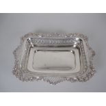 A Victorian silver oblong Dish with pierced and floral embossed border, London 1896, maker: Wm