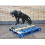 A Chinese black stone Statue of a Panther, 4ft L x 2ft 10in H