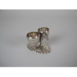 A Continental silver Donkey carrying two salts on oval base