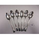 Six 19th Century silver Dessert Spoons with feather edges, four with crests, various dates and