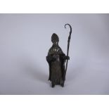 A bronze Figure of a Bishop holding open book and staff, 9in