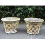 A pair of composition buff coloured Garden Planters with lattice design, one chipped, 1ft 9in diam x