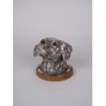 A plated Inkwell in the form of a dog's head, hinged to open, marked W H & Co, 4in H