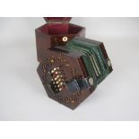 A 19th Century rosewood cased hexagonal Concertina, labelled C Wheatstone, Inventor, 20 Conduit