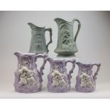 A set of three Samuel Alcock Victorian Staffordshire relief moulded pottery Jugs and two Others, the