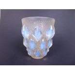 A Lalique Vase, relief moulded with irridescent diamond lozenges, interspersed with floral design,