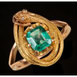 An Emerald Serpent Ring claw-set cushion-cut stone within coiled snake frame, rose-cut diamonds to