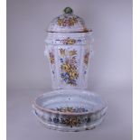 A large Continental faience Cistern, Cover and Bowl, floral decorated, Cistern 25in