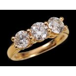 A Diamond three stone Ring claw-set brilliant-cut stones, total diamond weight 1.80cts, in 18ct