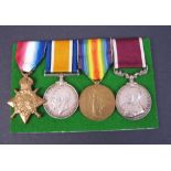 Four: 1914-15 STAR (6336 Pte. M. Woods R. Muns. Fus), BRITISH WAR & VICTORY MEDALS (6336 Pte. M.