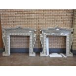 A pair of painted wood and marble Fire Surrounds with pagoda type surmount and scroll sides, 5ft 3in