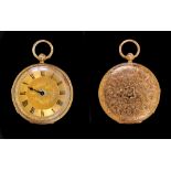 An 18ct gold cased Lady's open faced Fob Watch, thre floral engraved dial with roman numerals in