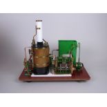 A Stationary Engine by Cheddar Models Ltd with vertical boiler within carrying case, 15 x 13in