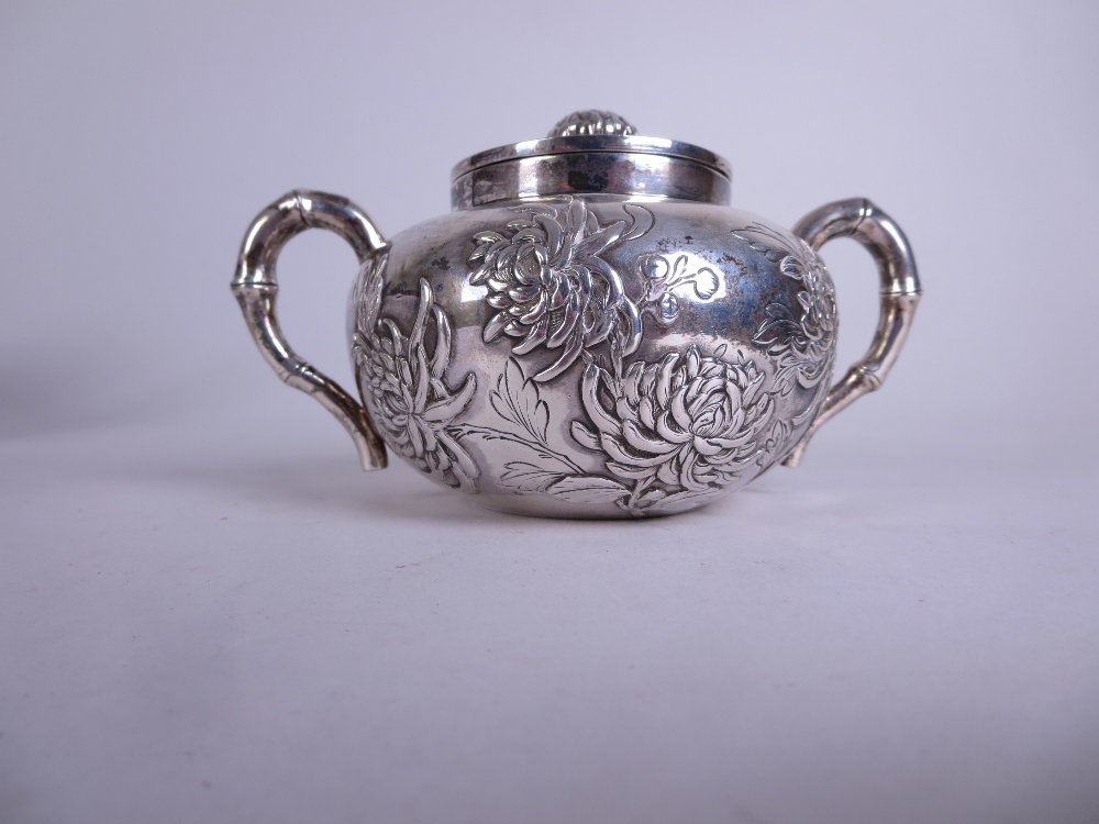 A Chinese silver three piece Tea Service decorated insects and chrysanthemum, the teapot and sucrier - Image 8 of 10