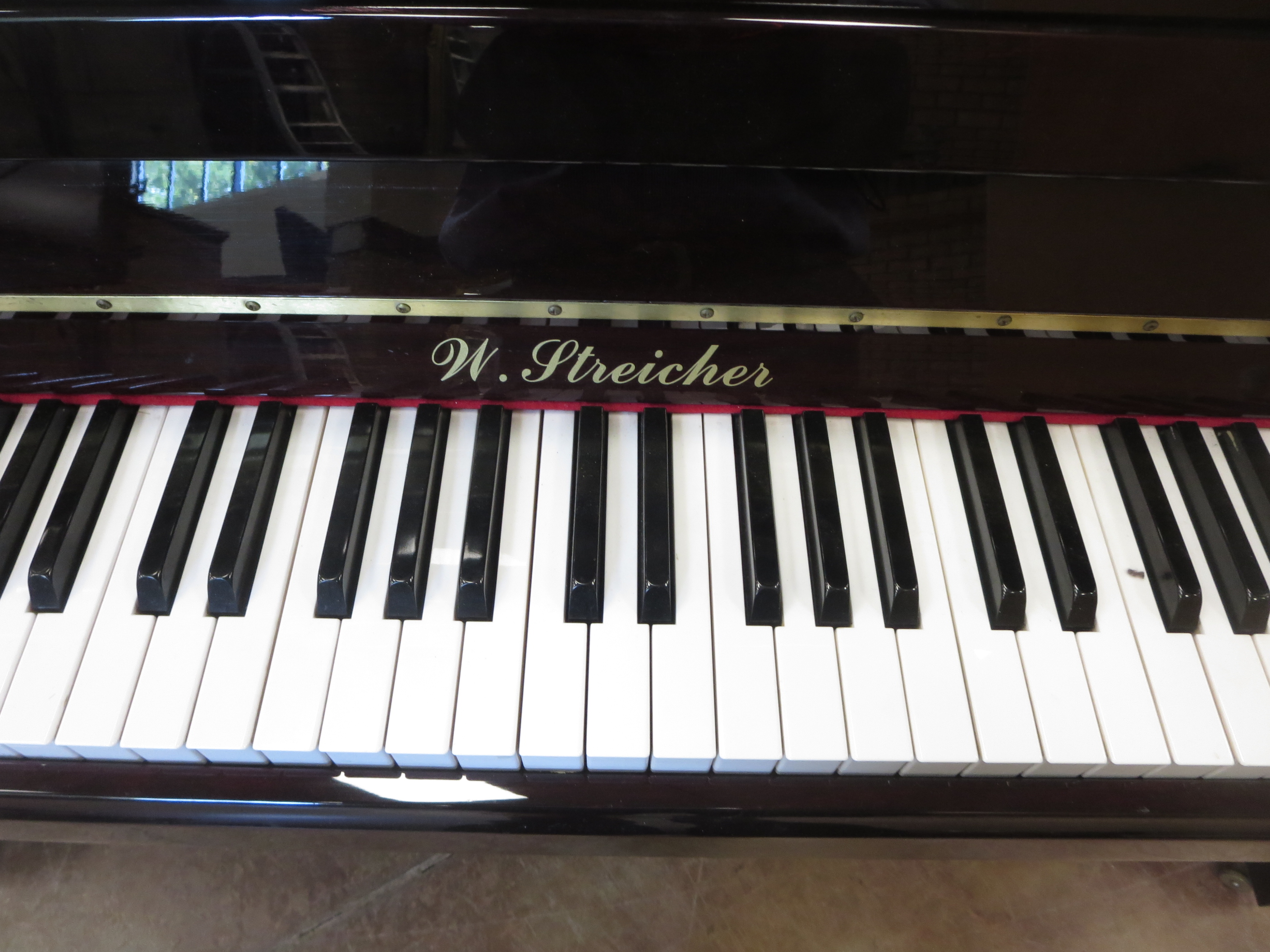 A good quality modern upright Piano by W Streicher, 7 1/4 octaves, iron frame, overstrung, in highly - Image 2 of 9