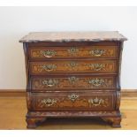 A Dutch marquetry bombé Commode with shaped top, inlaid vases of flowers above four long graduated