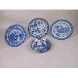 Four Chinese blue and white Dishes, late 18th/early 19th Century, comprising a Saucer Dish painted
