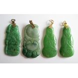 A Collection of four Chinese Jade Pendants