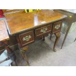 A reproduction Lowboy in the Georgian style, fitted three frieze drawers on cabriole supports, 2ft