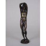 A bronze classical Figure of a young man, arms above his head, 8 1/2 H