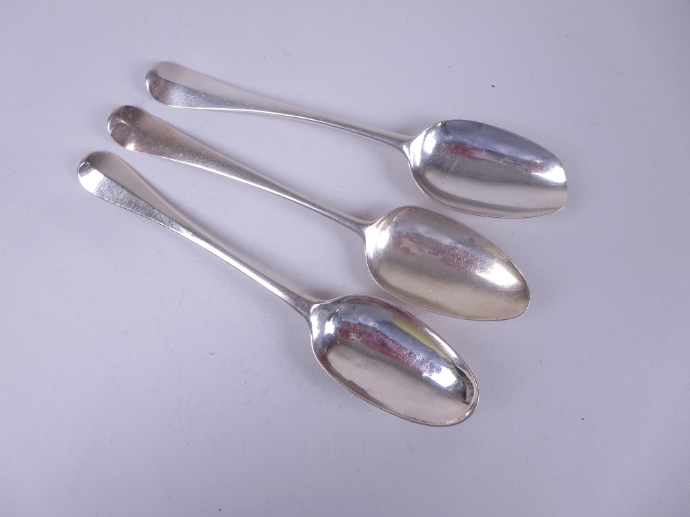A George I silver Table Spoon, hanovarian pattern with rat tail bowl, engraved initials, London