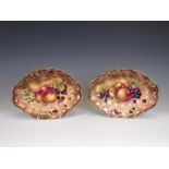 A pair of Royal Worcester Dishes of shaped oval form painted still life of fruit, signed S. Smith,