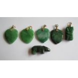 A Collection of six Chinese Jade Pendants