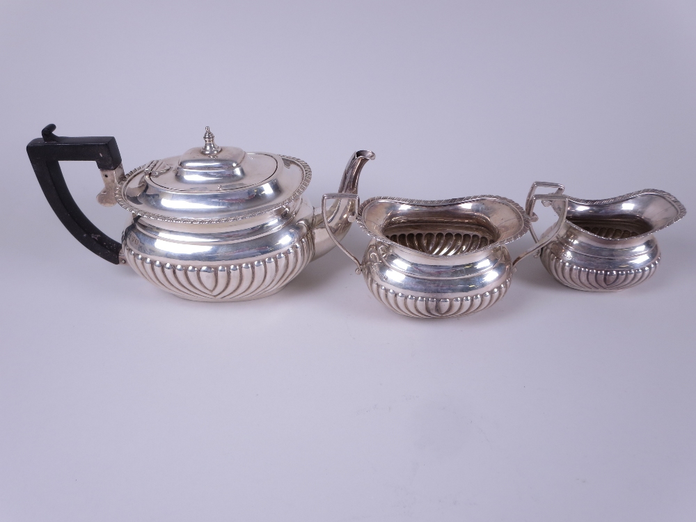 A Victorian silver three piece Tea Service of semi-fluted boat shape, Chester 1896 - Image 2 of 2