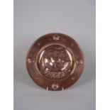An Arts and Crafts copper Plaque in the Newlyn style embossed with the design of a galley, 10 1/2 in