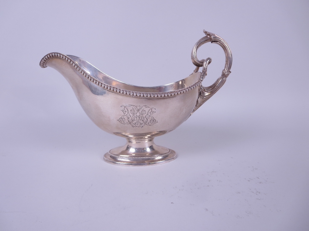 A Victorian silver large Sauce Boat engraved bird crest and monogram, beaded rim, leafage scroll - Image 3 of 3