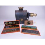 A German Magic Lantern Helios E.P. No 785, in original wooden box, and three boxes of slides