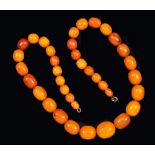 A graduated Amber type Bead Necklace, approx 130gms